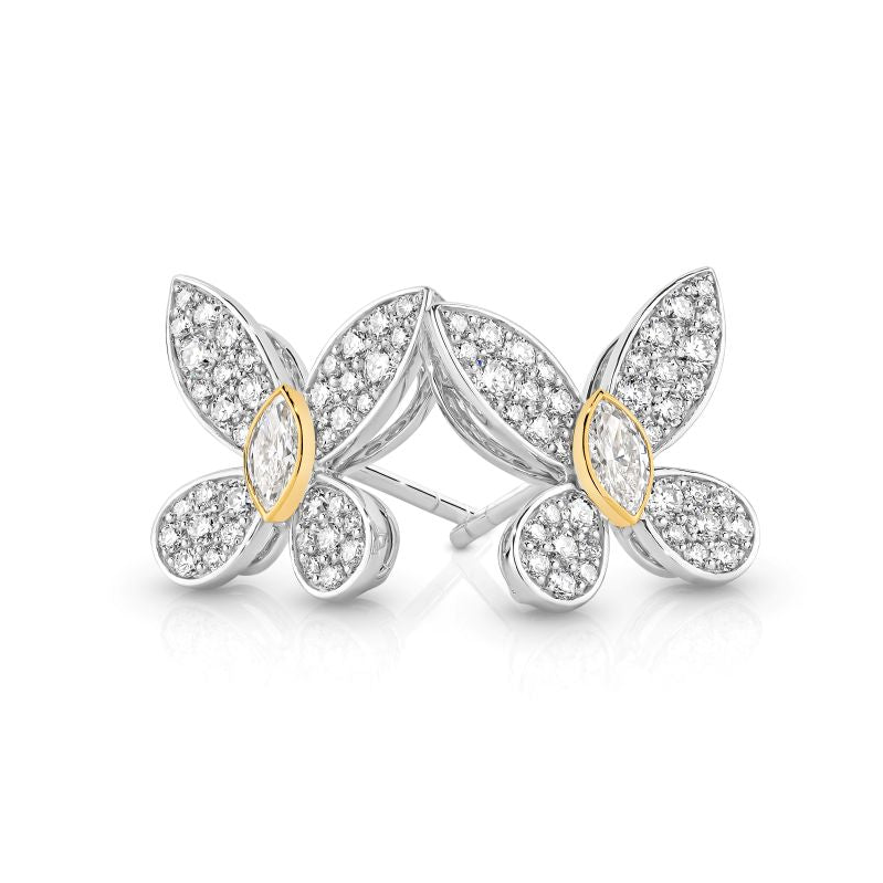 Diamond set butterfly studs in white gold with a yellow gold bezel around the centre body marquise shaped diamond.